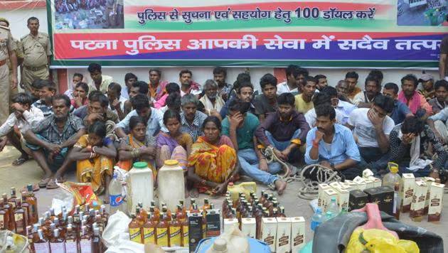 Bihar police destroying seized liquor in Gaya district